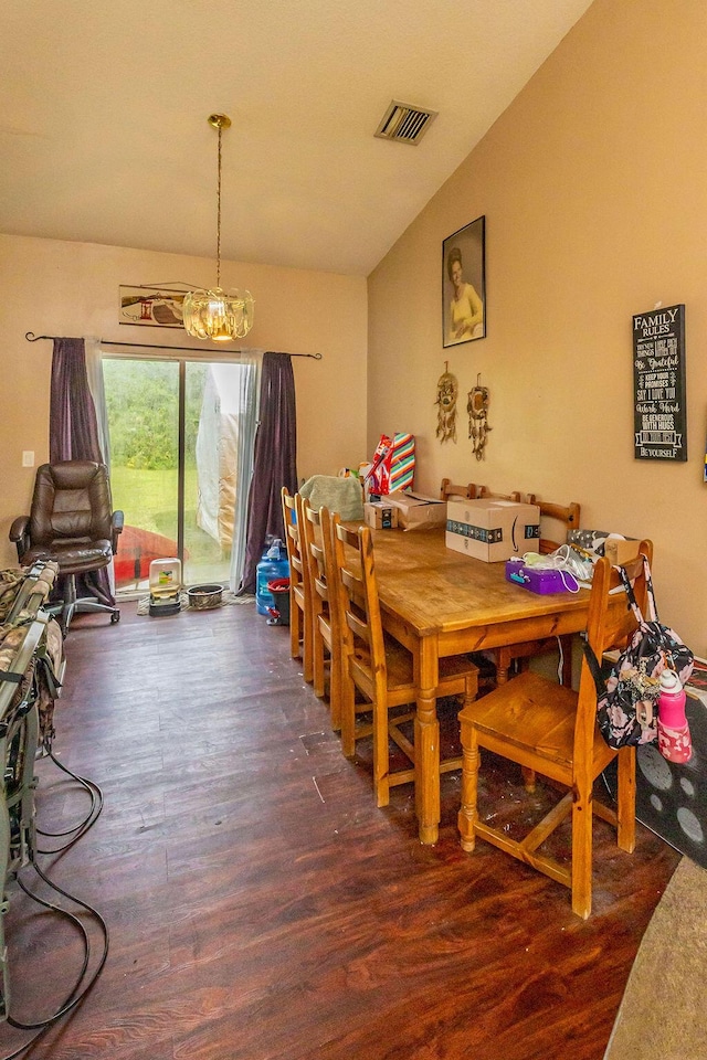 17331 38th Rd N, Loxahatchee, FL 33470 - dining area with wood finished floors and a chandelier