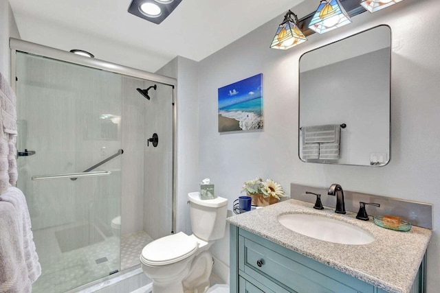 212 Somerset K, West Palm Beach, FL 33417 - full bath featuring toilet, vanity, and a stall shower