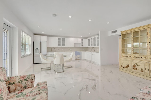 20 Somerset Unit A, West Palm Beach, FL 33417 - dining room with light marble finish flooring and recessed lighting