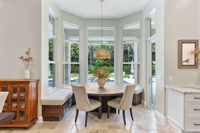 7815 Fairway Ln, West Palm Beach, FL 33412 - dining room with stone tile floors and baseboards