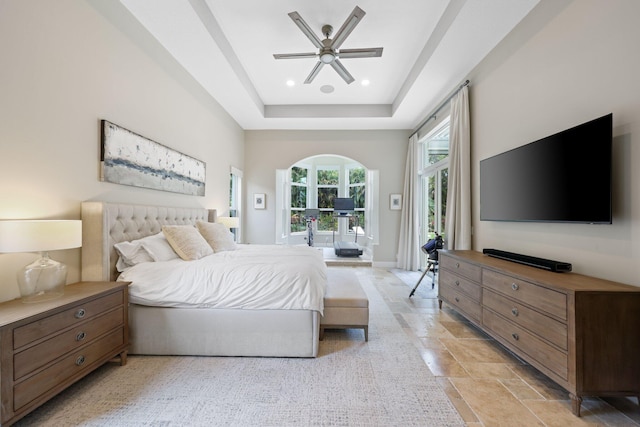 7815 Fairway Ln, West Palm Beach, FL 33412 - bedroom with access to exterior, light stone finish flooring, a raised ceiling, ceiling fan, and recessed lighting