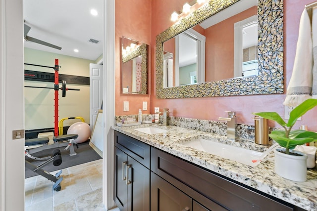 7815 Fairway Ln, West Palm Beach, FL 33412 - full bathroom with double vanity and recessed lighting