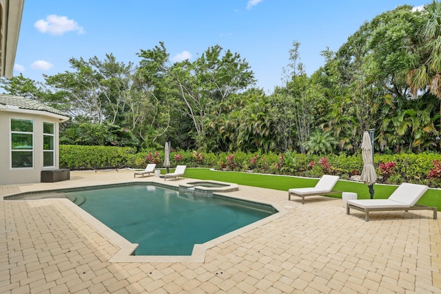 7815 Fairway Ln, West Palm Beach, FL 33412 - view of pool with a patio and a pool with connected hot tub