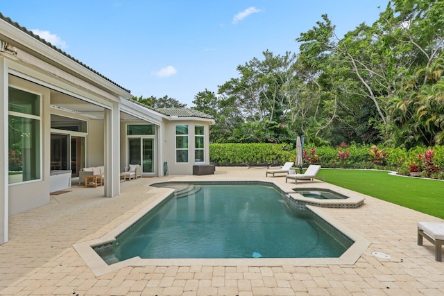 7815 Fairway Ln, West Palm Beach, FL 33412 - view of swimming pool featuring a patio area and a pool with connected hot tub
