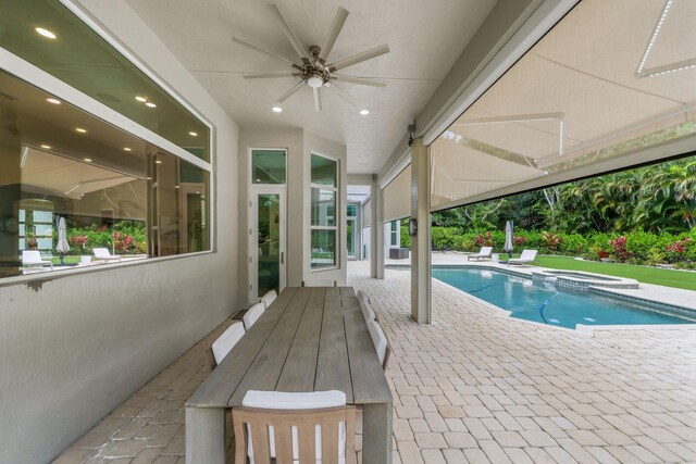 7815 Fairway Ln, West Palm Beach, FL 33412 - view of pool with a patio area, ceiling fan, and a pool with connected hot tub