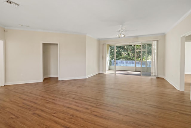 2365 55th Sq, Vero Beach, FL 32966 - unfurnished room with ornamental molding, wood finished floors, baseboards, and ceiling fan