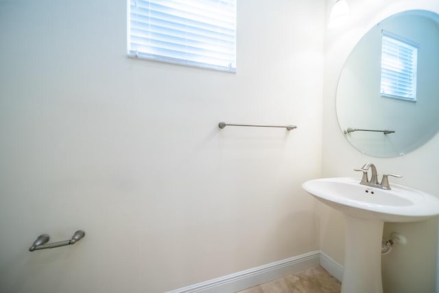 8328 Cocoplum Sound Ln, West Palm Beach, FL 33411 - bathroom featuring baseboards