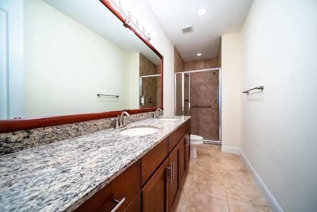 8328 Cocoplum Sound Ln, West Palm Beach, FL 33411 - bathroom with toilet, double vanity, a stall shower, baseboards, and recessed lighting