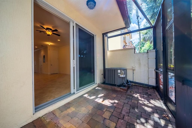 8328 Cocoplum Sound Ln, West Palm Beach, FL 33411 - sunroom / solarium featuring a ceiling fan