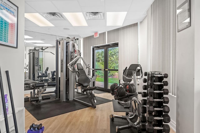 8800 S Ocean Dr Unit 710, Jensen Beach, FL 34957 - gym with wood finished floors and a paneled ceiling