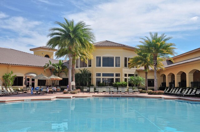 7535 Tarpon Cove Cir, Lake Worth, FL 33467 - community pool featuring a patio area