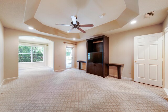 7535 Tarpon Cove Cir, Lake Worth, FL 33467 - unfurnished living room with a raised ceiling, recessed lighting, carpet flooring, baseboards, and ceiling fan