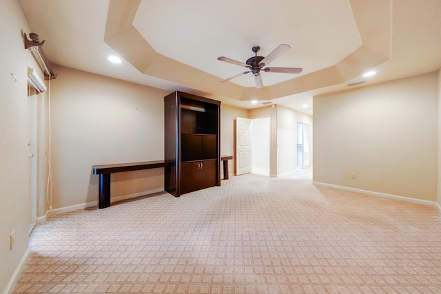 7535 Tarpon Cove Cir, Lake Worth, FL 33467 - unfurnished room featuring light carpet, recessed lighting, a tray ceiling, and a ceiling fan