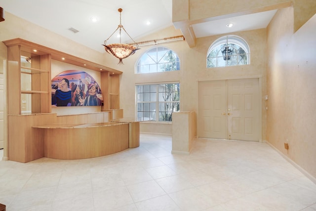 7535 Tarpon Cove Cir, Lake Worth, FL 33467 - foyer entrance featuring tile patterned floors, high vaulted ceiling, baseboards, and recessed lighting