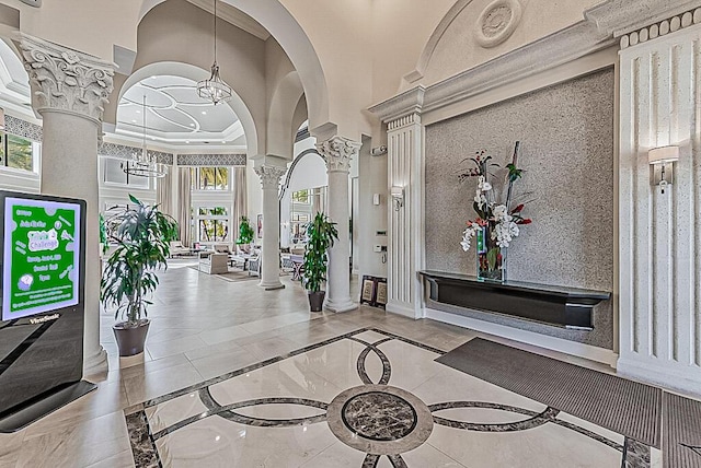 7535 Tarpon Cove Cir, Lake Worth, FL 33467 - lobby with a high ceiling and crown molding
