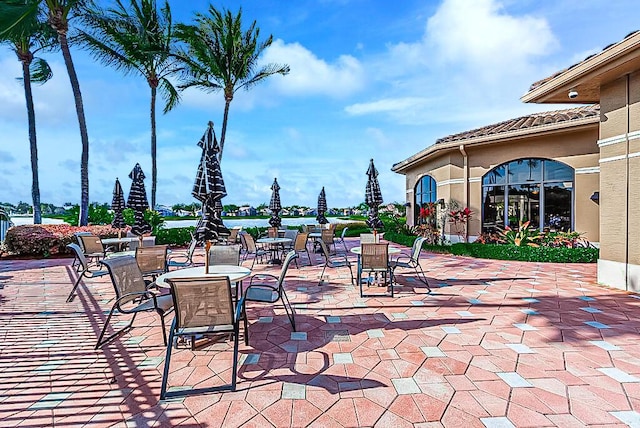 7535 Tarpon Cove Cir, Lake Worth, FL 33467 - view of patio featuring outdoor dining space