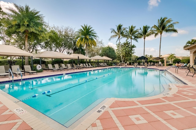7535 Tarpon Cove Cir, Lake Worth, FL 33467 - community pool with a gazebo and a patio