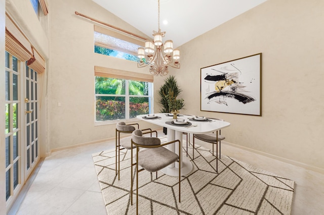 7535 Tarpon Cove Cir, Lake Worth, FL 33467 - dining area with a chandelier, high vaulted ceiling, baseboards, and light tile patterned floors