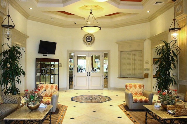 7535 Tarpon Cove Cir, Lake Worth, FL 33467 - foyer entrance featuring a towering ceiling, tile patterned floors, crown molding, coffered ceiling, and french doors