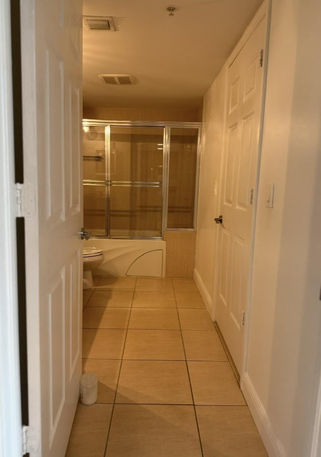 610 Clematis St Unit 336, West Palm Beach, FL 33401 - hallway with light tile patterned floors