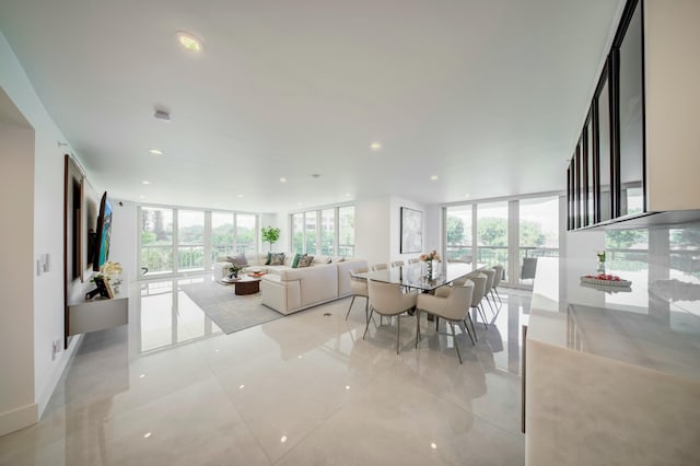 901 E Camino Real Unit 2A, Boca Raton, FL 33432 - dining space featuring plenty of natural light, floor to ceiling windows, and recessed lighting