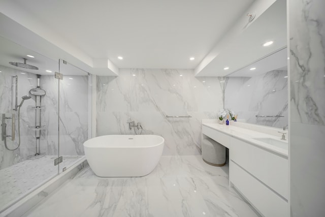 901 E Camino Real Unit 2A, Boca Raton, FL 33432 - full bath featuring a marble finish shower, a freestanding tub, recessed lighting, vanity, and marble tiled floors