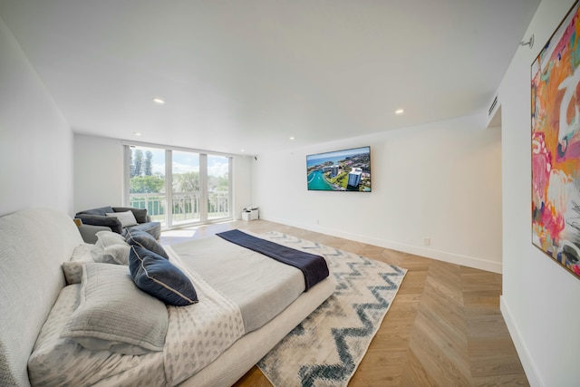 901 E Camino Real Unit 2A, Boca Raton, FL 33432 - bedroom featuring baseboards and recessed lighting