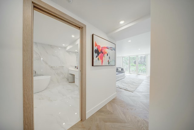 901 E Camino Real Unit 2A, Boca Raton, FL 33432 - hallway with recessed lighting and baseboards