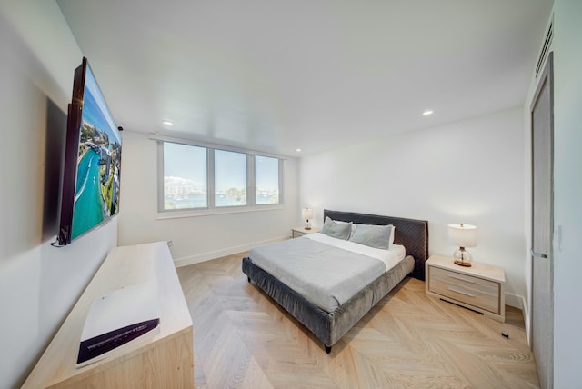 901 E Camino Real Unit 2A, Boca Raton, FL 33432 - bedroom featuring baseboards and recessed lighting
