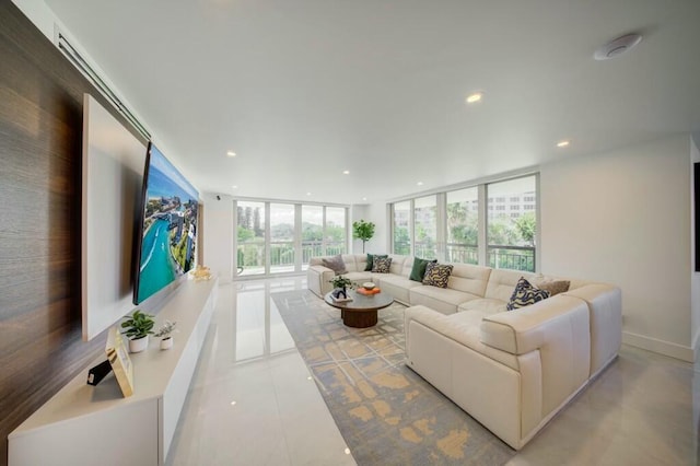 901 E Camino Real Unit 2A, Boca Raton, FL 33432 - tiled living room with recessed lighting and floor to ceiling windows