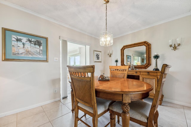 1803 SW 5th Ave, Boynton Beach, FL 33426 - dining area with crown molding, light tile patterned floors, baseboards, a chandelier, and a textured ceiling
