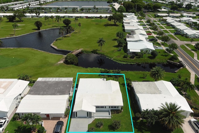 1803 SW 5th Ave, Boynton Beach, FL 33426 - aerial view of residential area featuring a nearby body of water, property boundaries highlighted, and a golf club