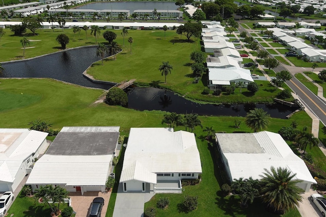 1803 SW 5th Ave, Boynton Beach, FL 33426 - aerial overview of property's location with a large body of water, nearby suburban area, and a golf course