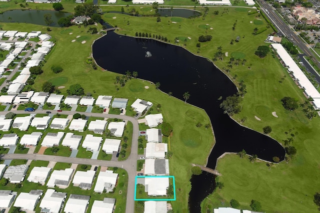 1803 SW 5th Ave, Boynton Beach, FL 33426 - aerial view of property and surrounding area featuring nearby suburban area, a large body of water, property boundaries highlighted, and a golf course