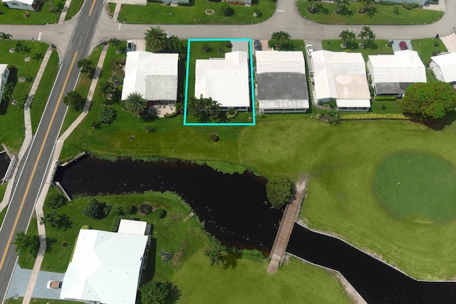 1803 SW 5th Ave, Boynton Beach, FL 33426 - aerial perspective of suburban area featuring a nearby body of water and property parcel outlined