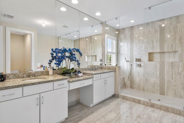 983 Hookline Cir, The Acreage, FL 33470 - full bath featuring walk in shower, vanity, and marble finish floors