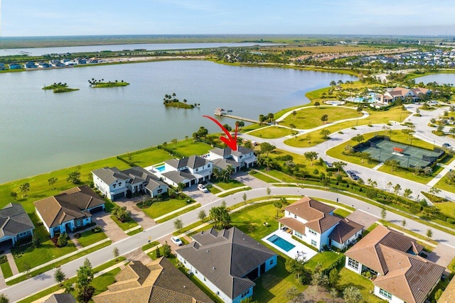 983 Hookline Cir, The Acreage, FL 33470 - aerial perspective of suburban area featuring a nearby body of water