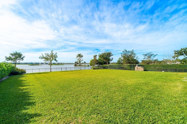 983 Hookline Cir, The Acreage, FL 33470 - view of yard featuring a water view