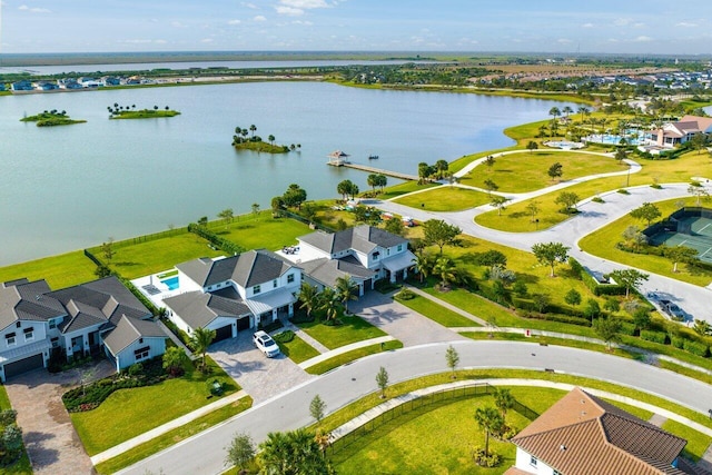 983 Hookline Cir, The Acreage, FL 33470 - aerial perspective of suburban area featuring a large body of water
