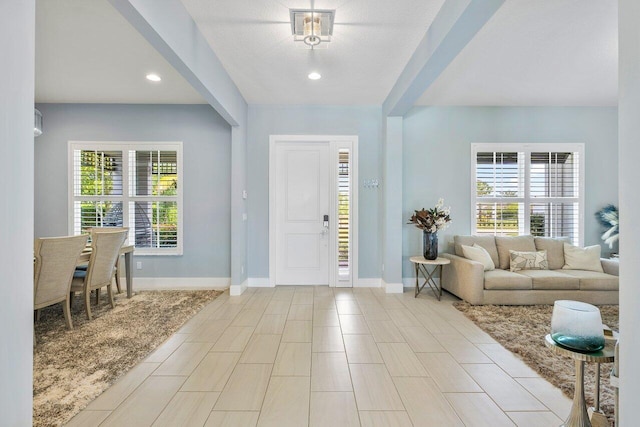 983 Hookline Cir, The Acreage, FL 33470 - entryway featuring plenty of natural light, baseboards, and recessed lighting