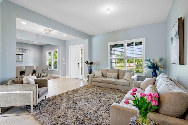 983 Hookline Cir, The Acreage, FL 33470 - living room featuring wood finished floors, recessed lighting, and baseboards