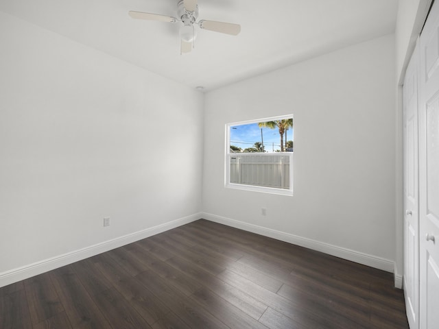 4107 Virginia Ter, West Palm Beach, FL 33405 - unfurnished bedroom featuring dark wood finished floors, baseboards, a closet, and a ceiling fan