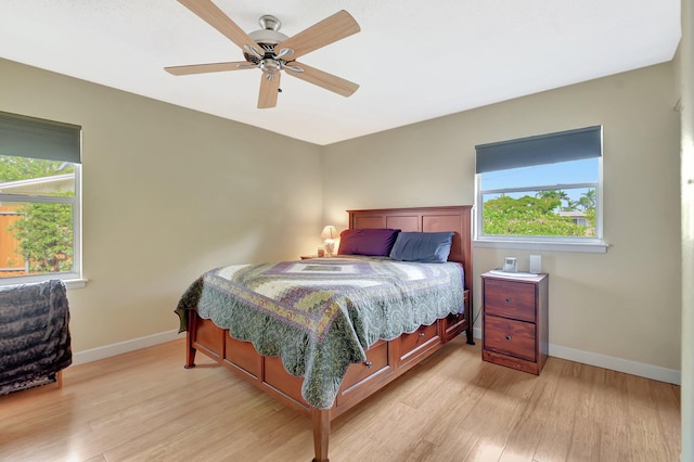 201 Rex Ct, Palm Springs, FL 33461 - bedroom with light wood-type flooring, multiple windows, and ceiling fan