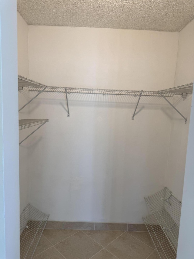 7535 S Orile Blvd Unit 108, Delray Beach, FL 33446 - spacious closet with tile patterned flooring