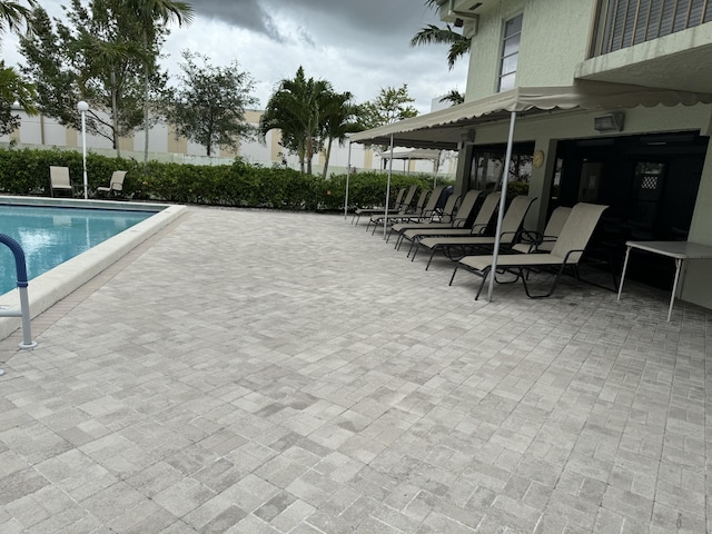 7535 S Orile Blvd Unit 108, Delray Beach, FL 33446 - community pool featuring a patio