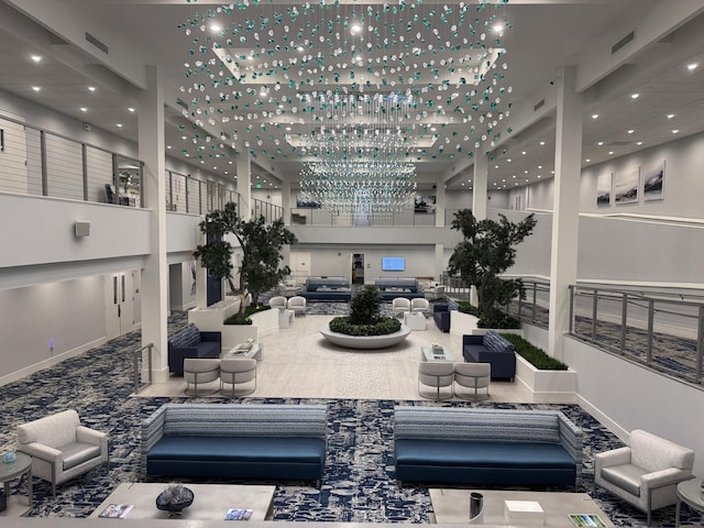 7535 S Orile Blvd Unit 108, Delray Beach, FL 33446 - common area featuring a towering ceiling and recessed lighting