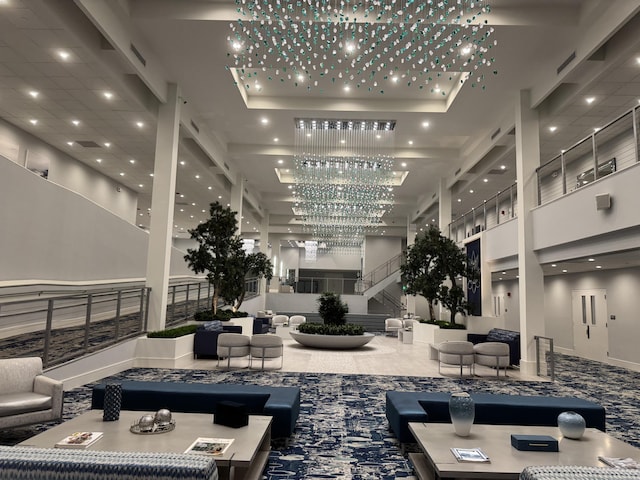 7535 S Orile Blvd Unit 108, Delray Beach, FL 33446 - building lobby featuring a high ceiling, recessed lighting, and stairs