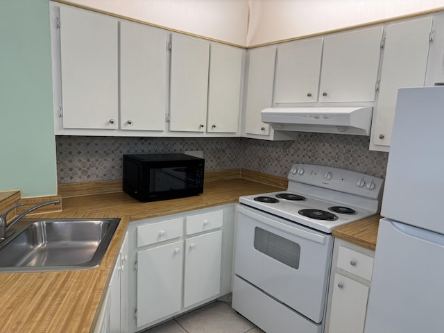 7535 S Orile Blvd Unit 108, Delray Beach, FL 33446 - kitchen featuring under cabinet range hood, white appliances, a sink, light countertops, and backsplash