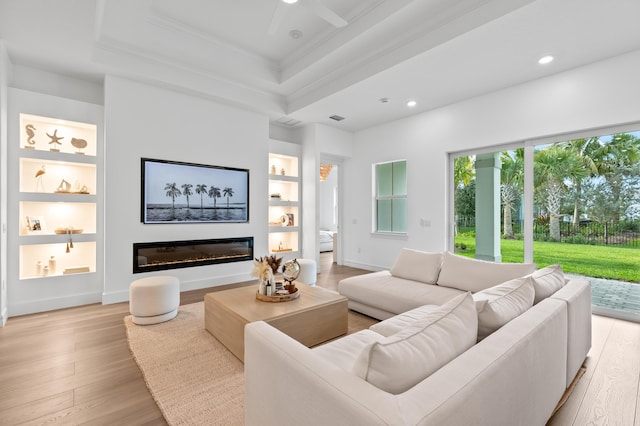 10803 Stellar Cir, Palm Beach Gardens, FL 33412 - living room with crown molding, built in features, light wood finished floors, recessed lighting, and ceiling fan