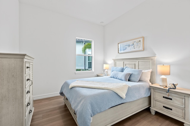 10803 Stellar Cir, Palm Beach Gardens, FL 33412 - bedroom featuring dark wood finished floors and baseboards